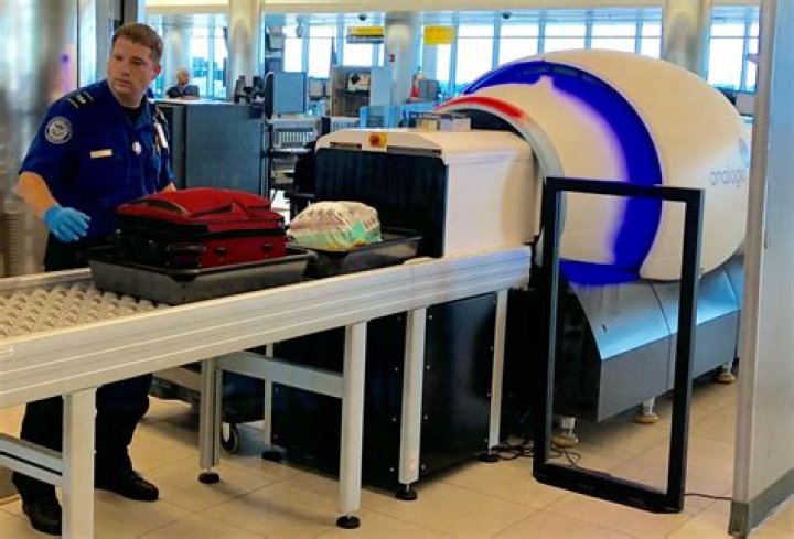 Perform a body search on at a TSA checkpoint