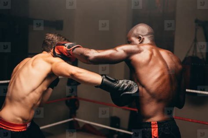 Quick punch in a boxing ring